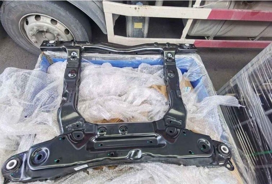 The black front subframe of steel-aluminum mixed structure of Geely Geometry A is used for car body parts.